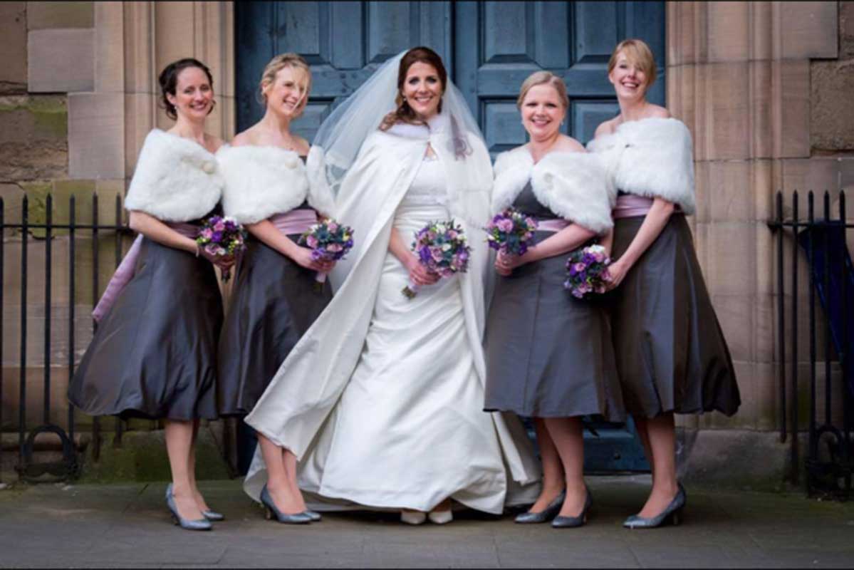 Purple themed bride and bridesmaids