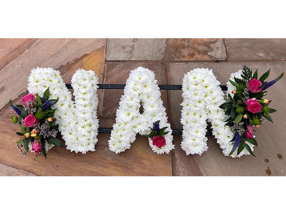 White and pink Nan flower display for funeral in the west midlands