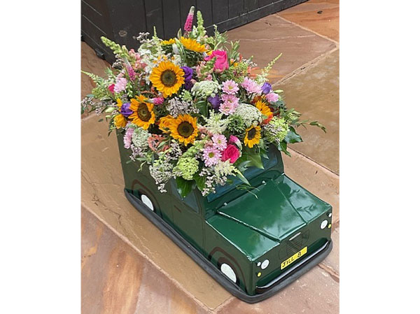 Land rover Floral display for a funeral in coventry