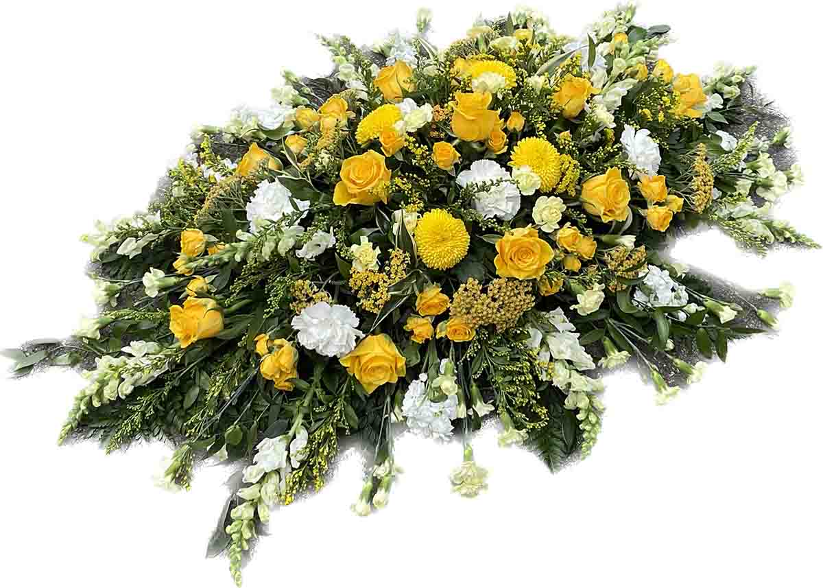 Yellow theme flower spray for a funeral