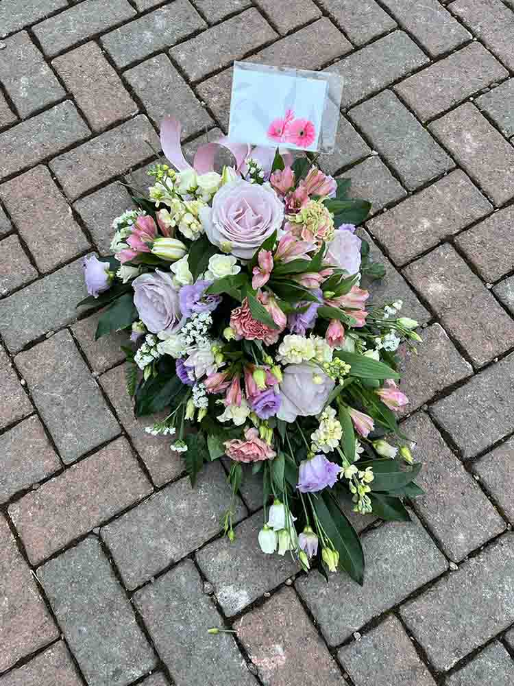 Purple Flower arrangement with a personalised message